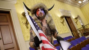 'QAnon Shaman' pleads guilty to felony charge for role in Jan. 6 Capitol riot