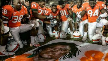 Ex-teammate pleads not guilty to killing Miami football star