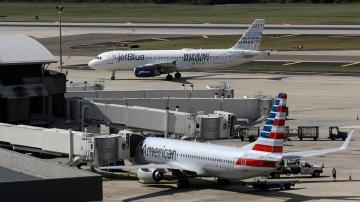 US sues to stop deal between American Airlines and JetBlue