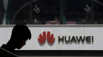 Justice Dept: Huawei exec poised to resolve criminal charges