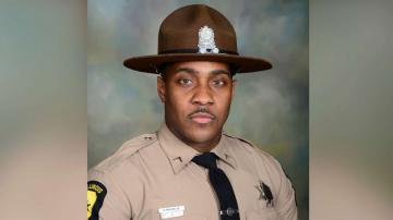 Death investigation into Illinois State Trooper found shot in squad car on highway