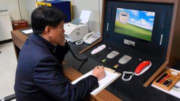 2 Koreas restore hotline despite North's missile tests