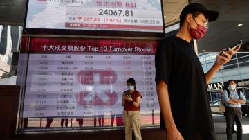 Asian shares slide after big-tech sell-off on Wall Street