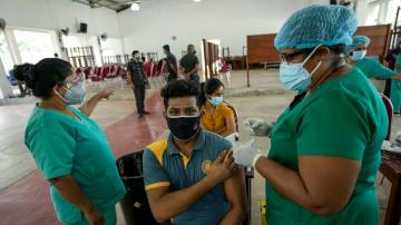 The Latest: Sri Lanka to start vaccinating schoolchildren