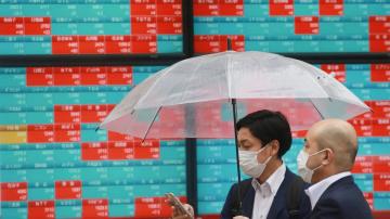 Asian shares mixed after muddled day of trading on Wall St