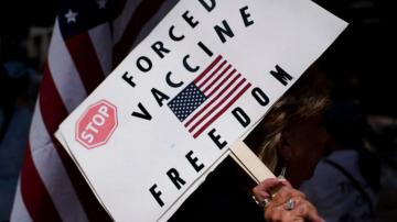 Texan charged in Baltimore with threatening vaccine advocate