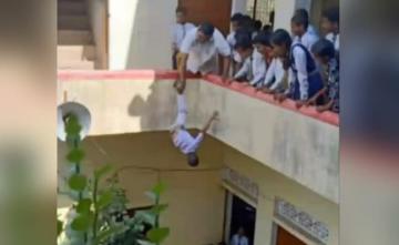 Viral Video Of Class 2 Boy Dangled By Foot Leads To UP Principal's Arrest