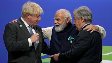 The Latest: India's leader warmly greeted at COP26 summit