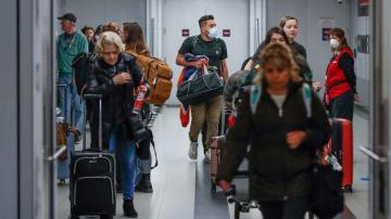 EXPLAINER: How US rules on international travel are changing
