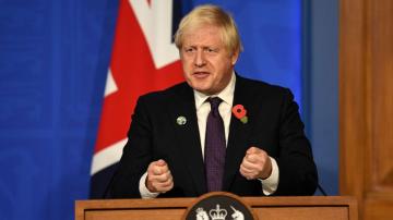 UK's Johnson: Climate deal sounds 'death knell' for coal