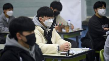 SKorea sees record virus jump as thousands take college exam
