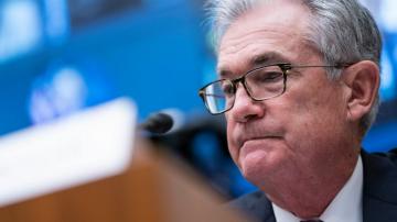 Fed officials express resolve to address inflation risks