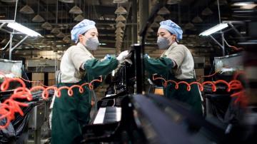 China manufacturing improves as power shortages ease