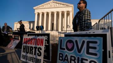 Abortion rights at stake in divided Supreme Court arguments