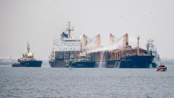 German ship with burning timber cargo towed to Swedish port