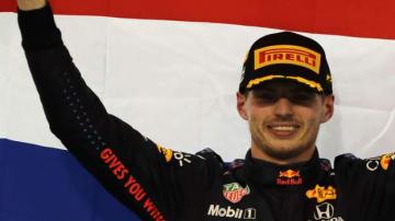 Max Verstappen wins title after last-lap overtake of Lewis Hamilton in Abu Dhabi