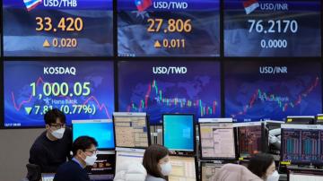 Asian shares mostly lower after tech-led retreat on Wall St