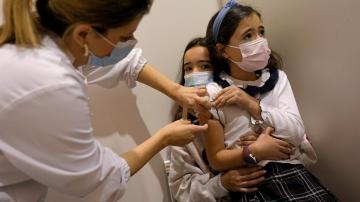 Spain, Portugal face new limits despite vaccine success