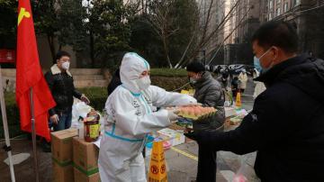 In locked down Chinese city, some complain food hard to get