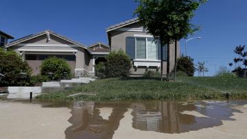 California imposes water restrictions as drought drags on
