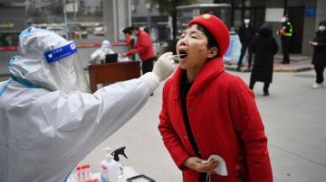 China reports major fall in virus cases in locked-down Xi'an