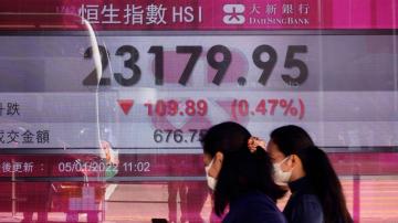 Asian shares mostly fall as tech stocks slump on Wall Street