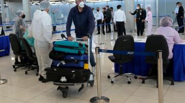 Thailand loosens entry restrictions as omicron worries ease