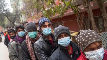 Nepal imposes tough restrictions as virus cases set record