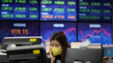 Asian shares decline amid omicron, Fed, Ukraine jitters