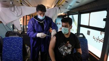 Virus-ravaged Iran finds brief respite with mass vaccination