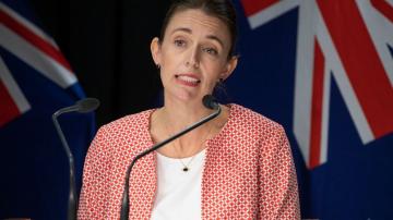Ardern tests negative as omicron takes hold in New Zealand