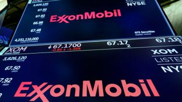 Exxon restructures divisions and packs up for Houston