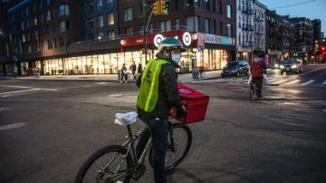 Food delivery workers, ride-share drivers demand more rights