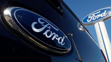 Ford rides accounting gains, high prices to big 2021 profit