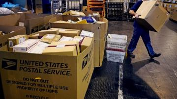 House OKs bill easing budget strains on Postal Service