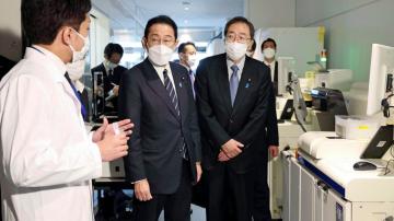Japan mulls easing COVID border controls amid criticism