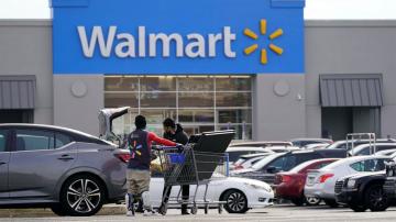 Walmart steers through inflation, boosting profit and sales