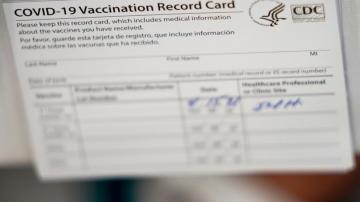 Marine reservist, nurse charged with fake vaccine card scam