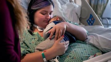 COVID-stricken mom reunites with baby 2 months after birth