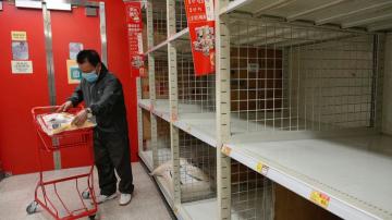 AP PHOTOS: Scenes from Hong Kong's COVID-19 crisis