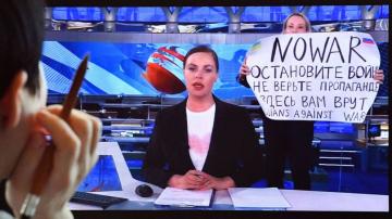 Anti-war protester who crashed Russian TV broadcast appears in Moscow court