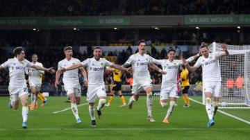 Wolves 2-3 Leeds: Visitors fight back against 10 men to earn bruising win