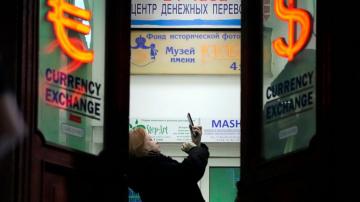 Russian stock market, crushed by war, will partially reopen