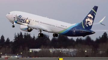 Alaska Airlines cancels dozens of flights as pilots picket