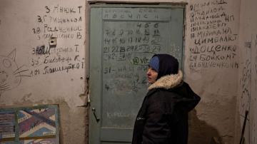 Ukrainian villagers count the dead after weeks of being confined in basement