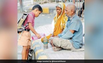Viral Photo: Boy Offers Water To Elderly Couple, Internet Emotional