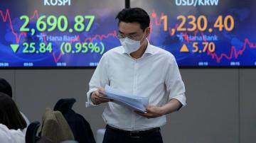 Asian shares fall, trading muted with Good Friday holidays