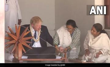 Watch: UK PM Boris Johnson Tries The Charkha At Gandhi's Ashram