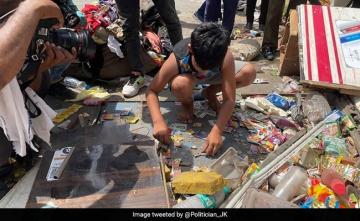 "Heart Wrenching": Boy Collects Coins At Father's Razed Jahangirpuri Shop