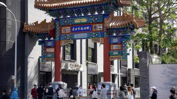 Beijing enforces mass COVID testing, closes neighborhoods